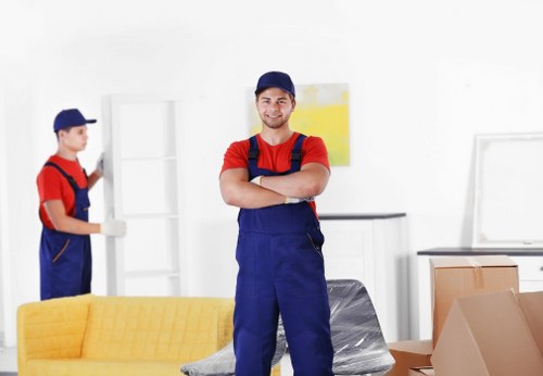 Removal team preparing a move in a Paddington apartment building