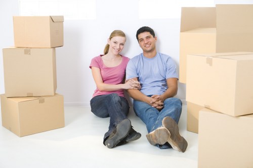 Moving team handling furniture in a Paddington street with parking considerations