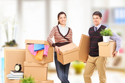 Packed moving boxes and furniture for Paddington home removals
