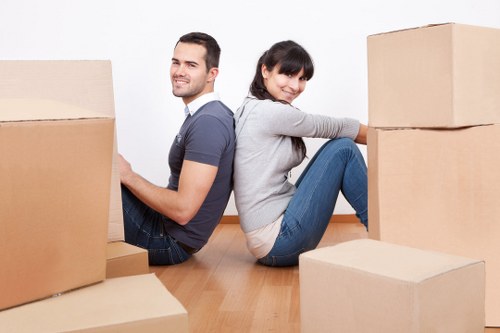 Local movers loading a van for a Paddington house move
