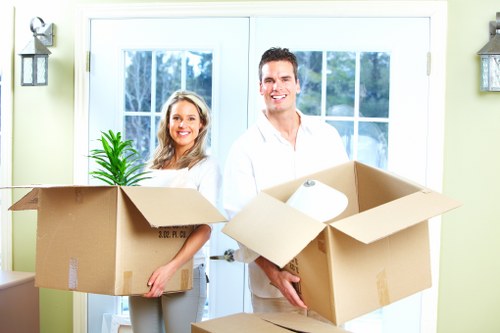 Removal team handling sofas and household furniture in Paddington