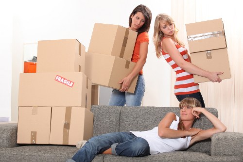 Team protecting floors and doorways during a house removal