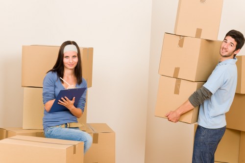 Loading furniture into a van near Paddington streets