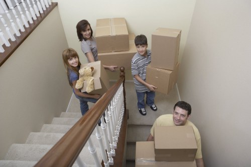 Packed moving boxes and furniture prepared for a Paddington relocation